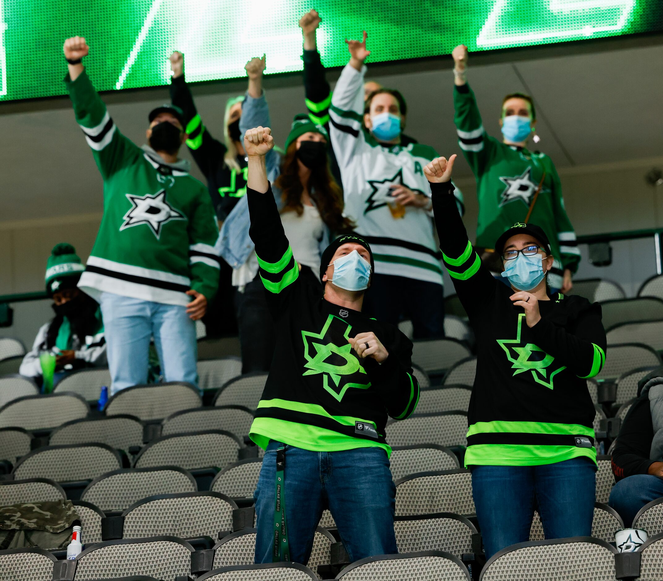 Dallas Stars fans celebrate a goal in the second period against the Columbus Blue Jackets at...