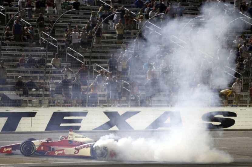 IZOD IndyCar Series Justin Wilson, driver of the No. 18 Sonny's BBQ Honda wins the Firestone...