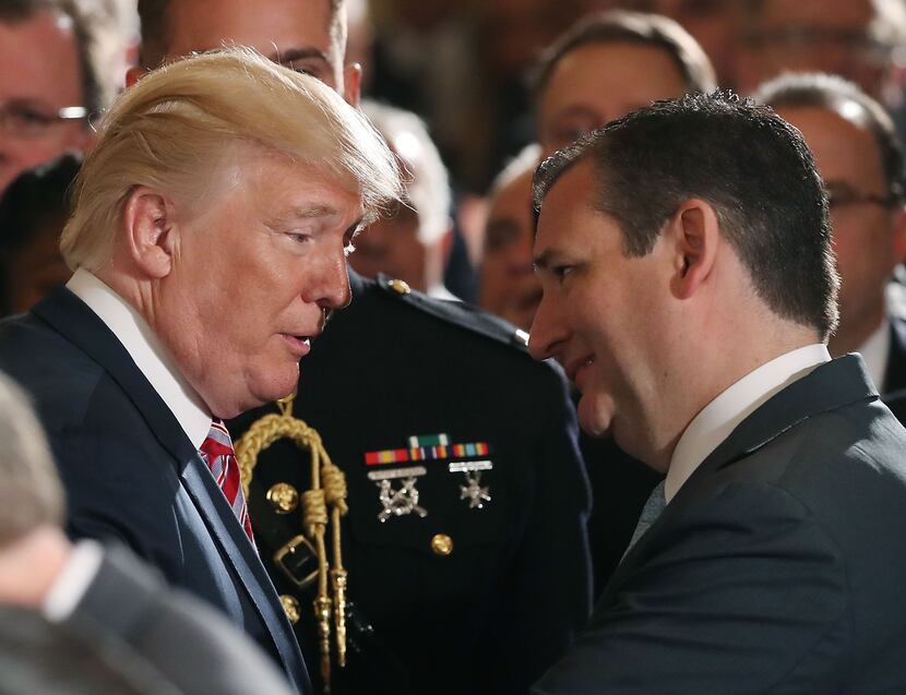 President Donald Trump and Sen. Ted Cruz speak in the East Room of the White House at an...
