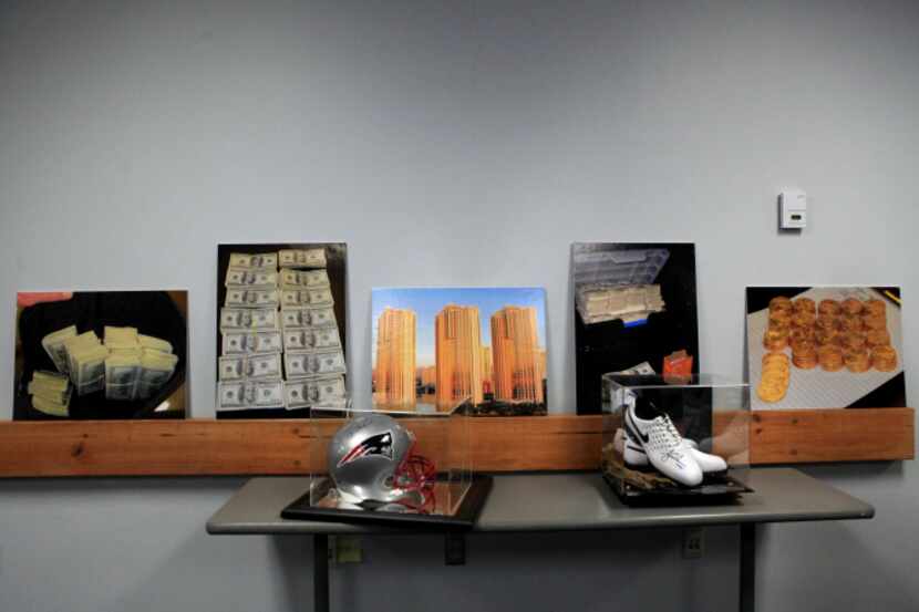 Some of the memorabilia seized during the sports ring bust was displayed at police...