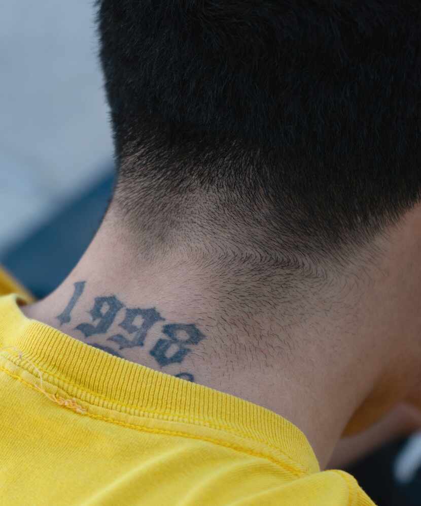 A photo by Fort Worth photographer Raul Rodriguez shows a skateboarder's tattoo. 
