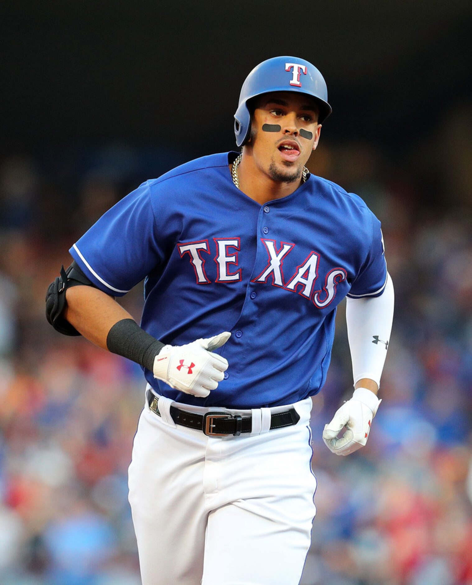 ARLINGTON, TX - MAY 23:  Ronald Guzman #67 of the Texas Rangers runs the bases after a three...