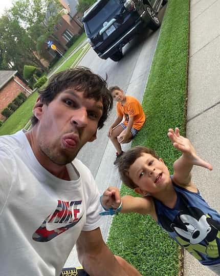Mavs center Boban Marjanovic takes a selfie with his children, 9-year-old Vuk and 4-year-old...