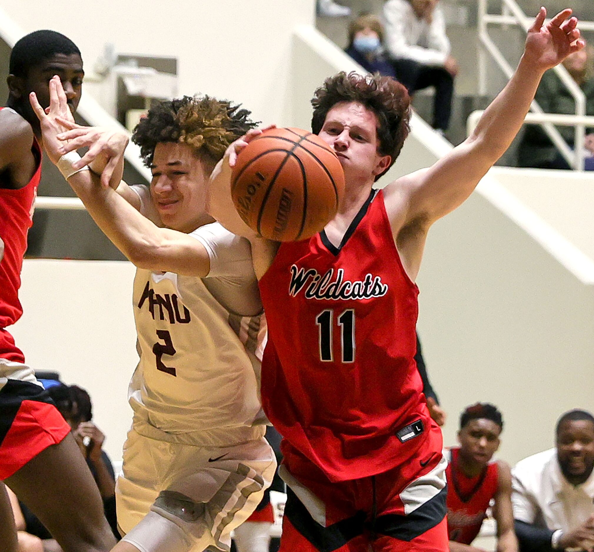 Lake Highland guard Reid Hocker (11) draws a foul on Plano guard Elijah Brown (2) during the...