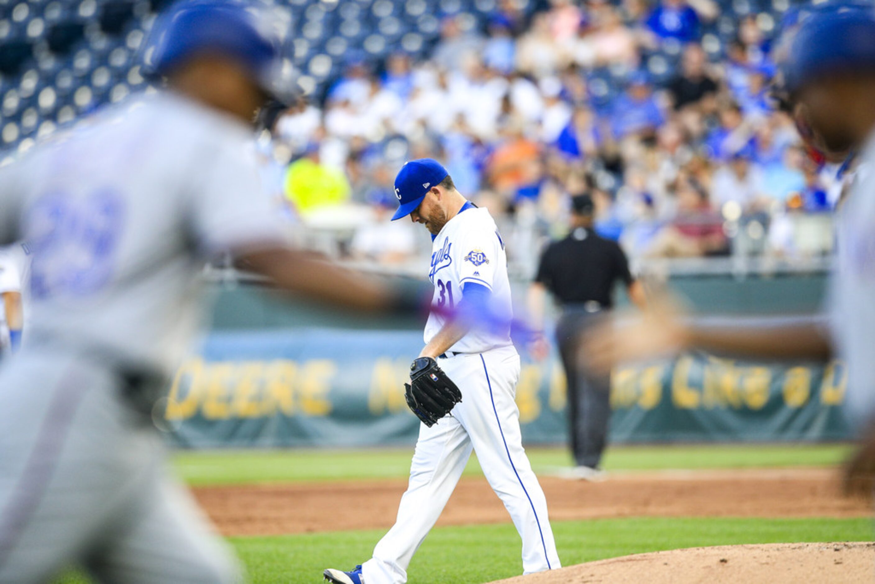 KANSAS CITY, MO - JUNE 18: Ian Kennedy #31 of the Kansas City Royals looks down in dejection...