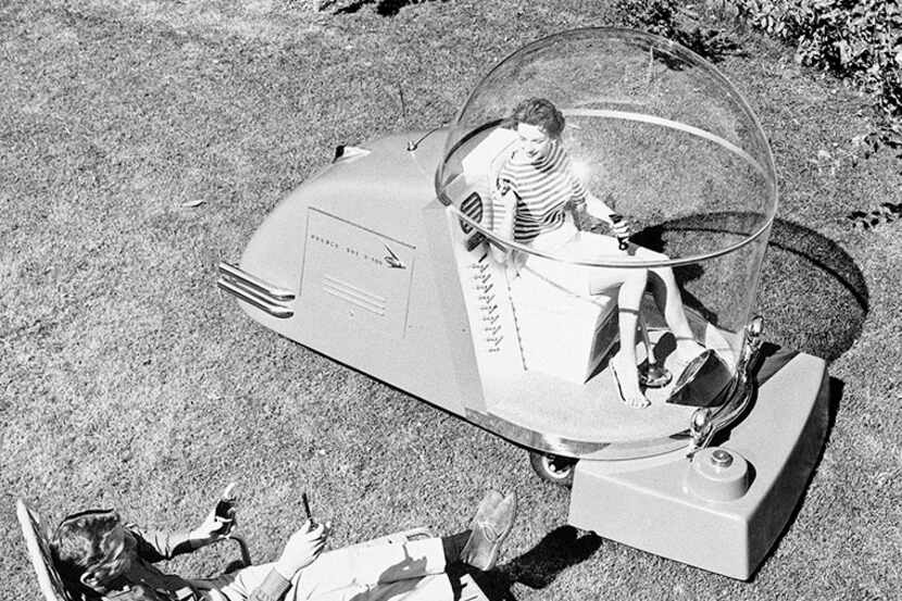  The "Power Mower of the Future" is demonstrated in Port Washington, Wis., Oct 14, 1957. The...
