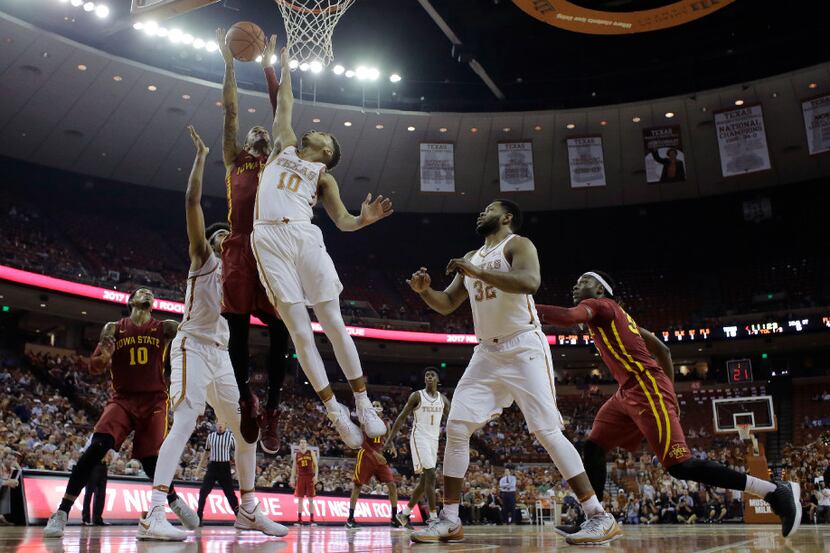 Iowa State guard Nick Weiler-Babb (1) is fouled as he drives to the basket against Texas...