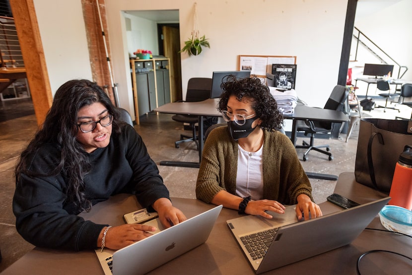 Customer experience specialists Rachel Clemente (left) and Grecia Rodriguez respond to...