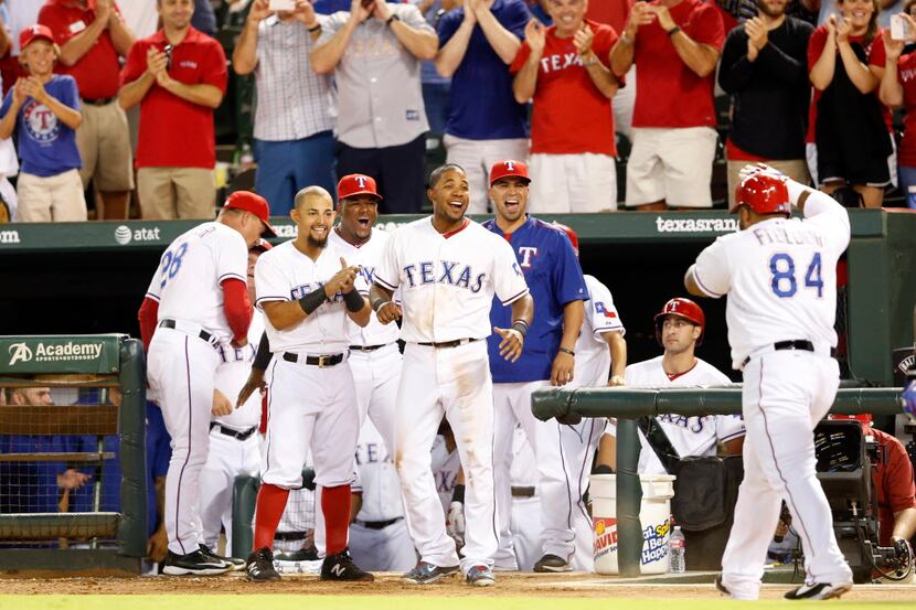 Texas Rangers second baseman Rougned Odor (12), Texas Rangers shortstop Elvis Andrus (1)...