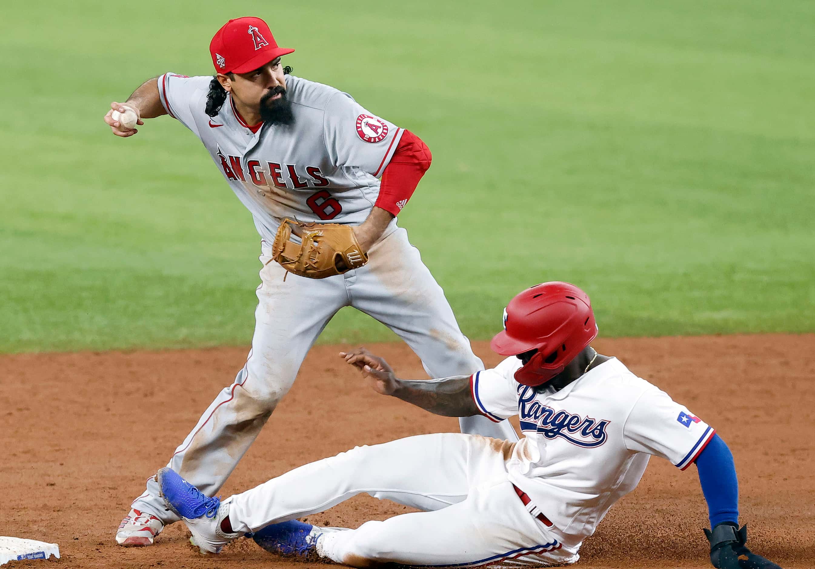 Los Angeles Angels third baseman Anthony Rendon (6) tagged second on a fielders choice to...