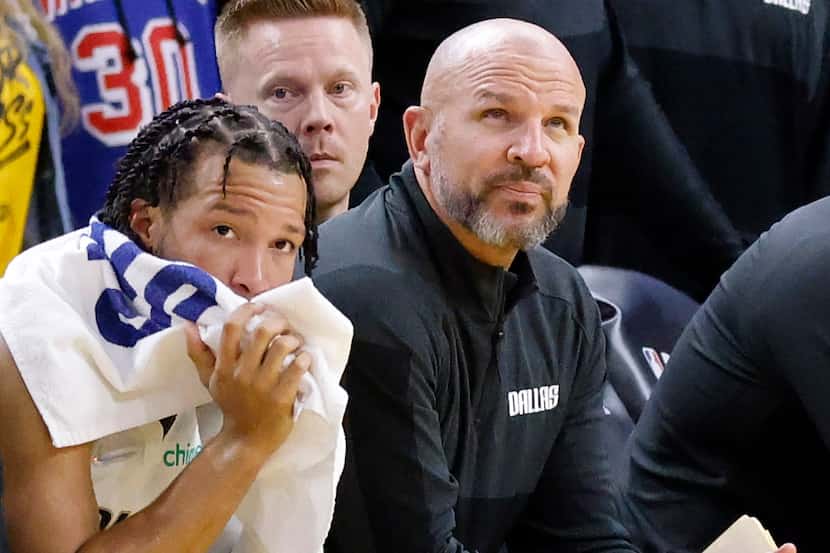 Dallas Mavericks head coach Jason Kidd (right) and guard Jalen Brunson can only watch late...