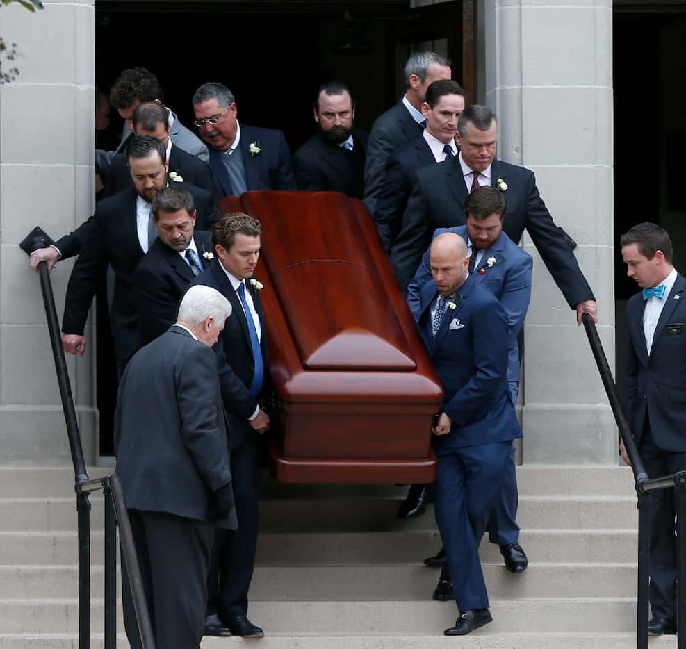 Pallbearers carried the casket of attorney Brian Loncar at Munger Place Church in Old East...