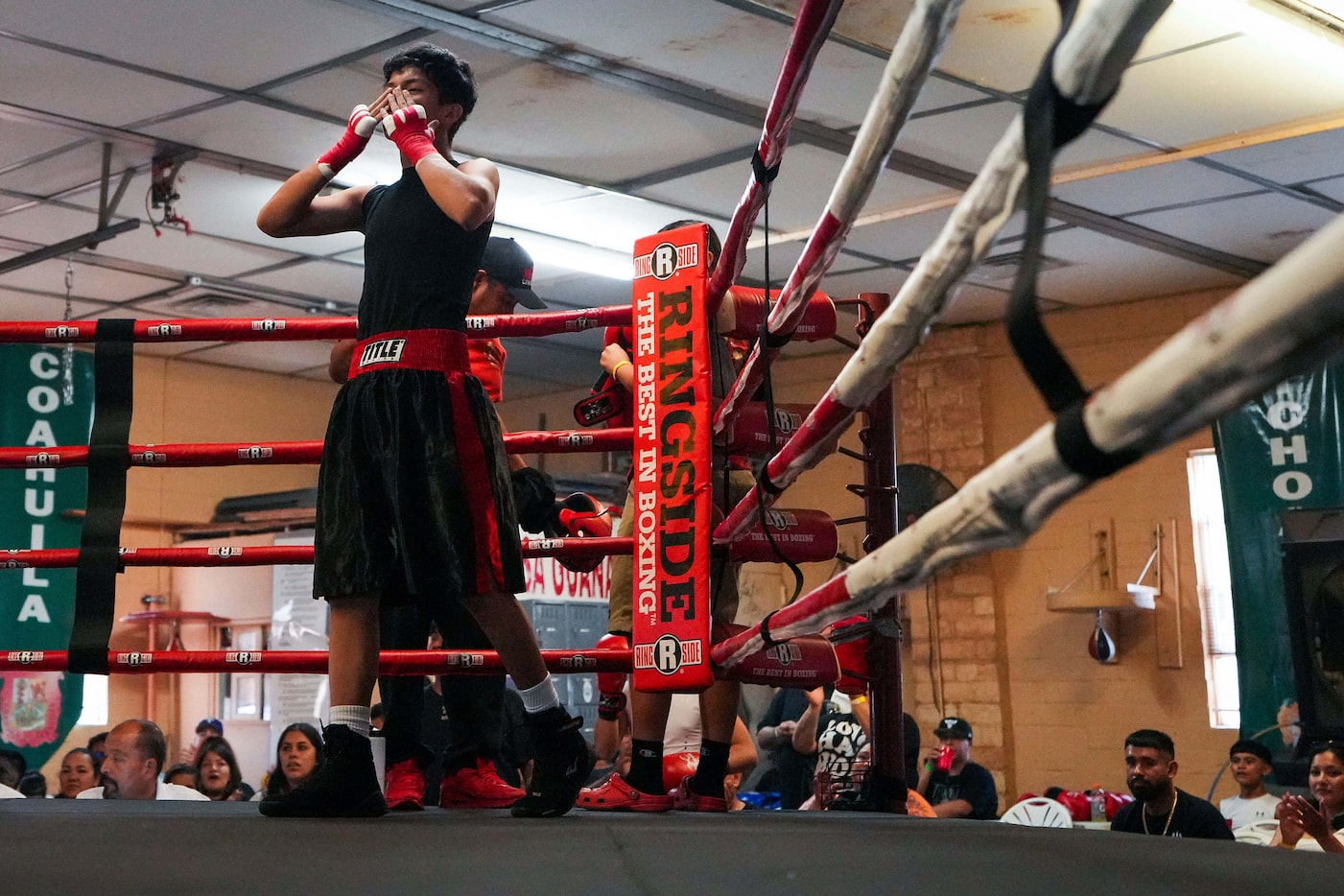 Fabian Galvan of Mares Boxing celebrates after winning his bout during a boxing tournament...