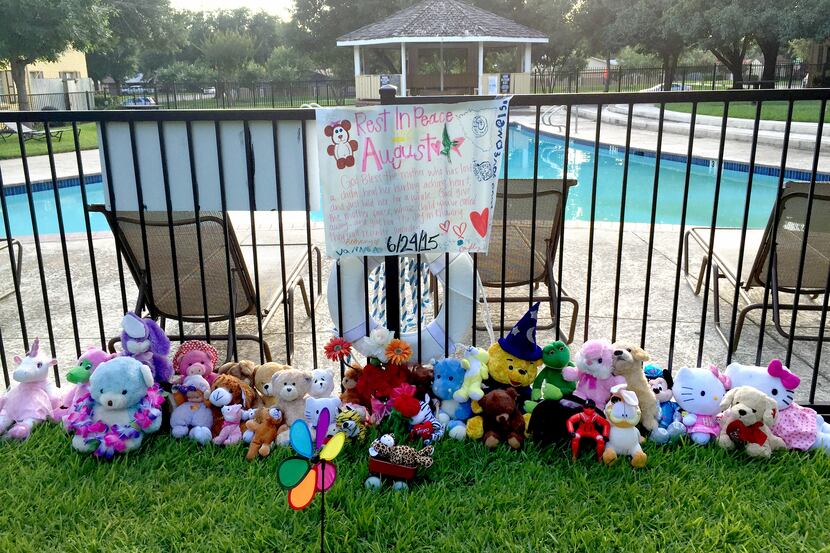 A memorial was set up outside the pool at the MacArthur Place at 183 complex in Irving where...