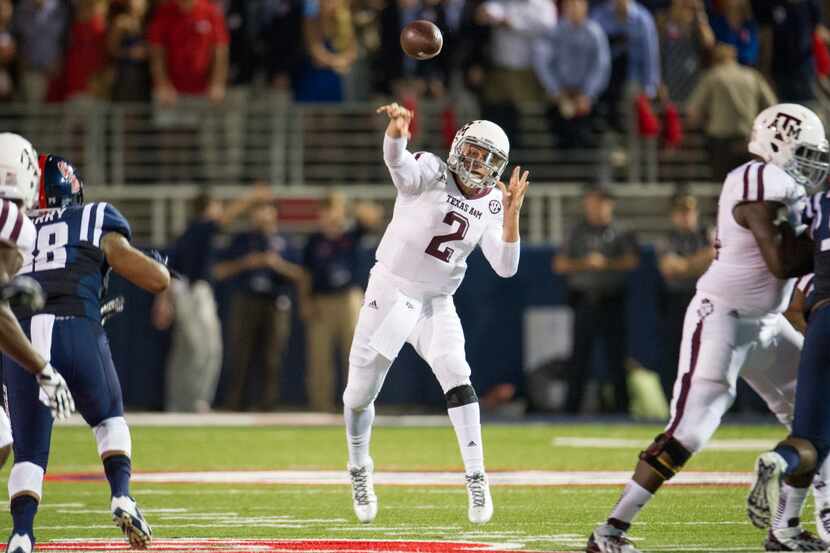OXFORD, MS - OCTOBER 12:  Quarterback Johnny Manziel #2 of the Texas A&M Aggies throws a...