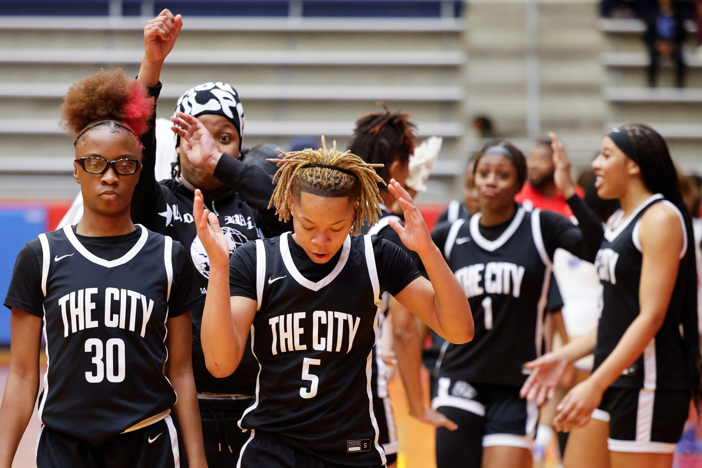 Duncanville high players celebrate following their win against Conway in Sandra Meadows...