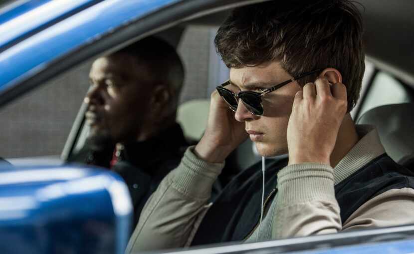 Ansel Elgort, right, and Jamie Foxx in a scene from "Baby Driver." With Baby's insistent...