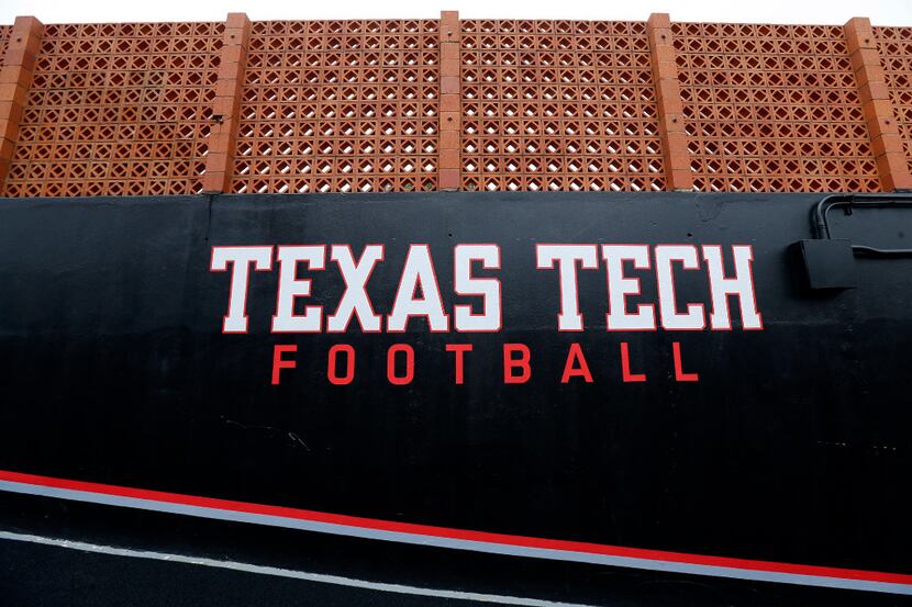 Texas Tech Football is painted on the tunnel was leading to the Jones AT&T Stadium field in...