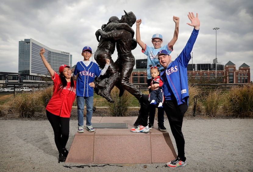 Texas Rangers fans Jose Soto, his wife, Lilliana Soto, sons Jacob (top right), 13, Adan, 9,...