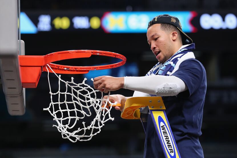 SAN ANTONIO, TX - APRIL 02:  Jalen Brunson #1 of the Villanova Wildcats cuts down the net...