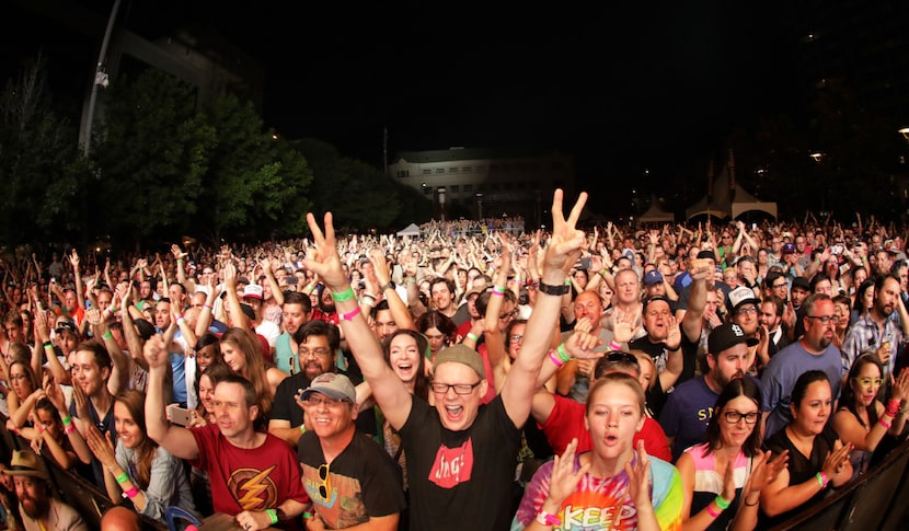 The crowd cheers as Tripping Daisy performs during Homegrown Music & Arts Festival in Dallas...