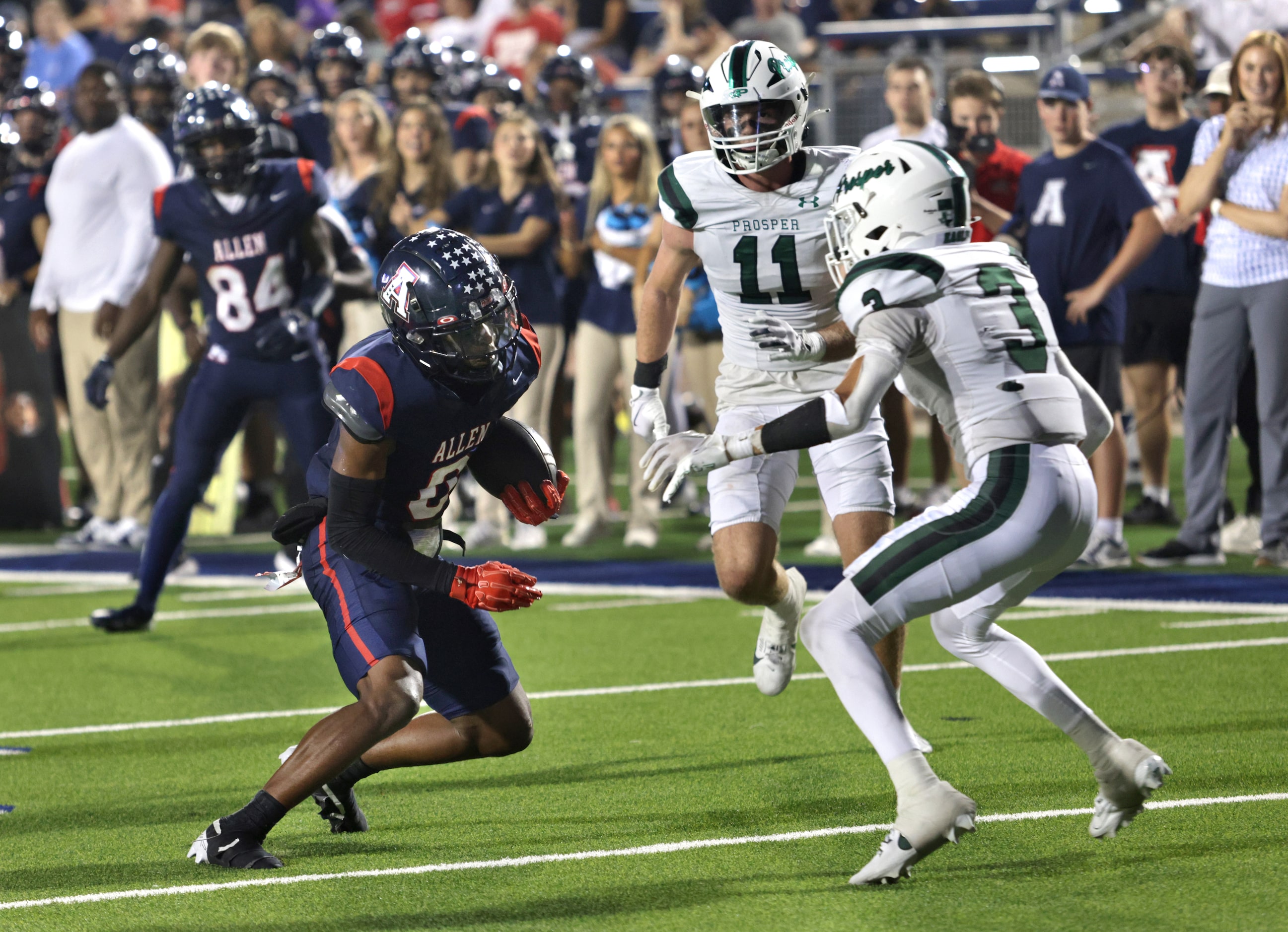 Allen player #0 Donnell Gee tries to get past Prosper player #3 Blake Summers during the...