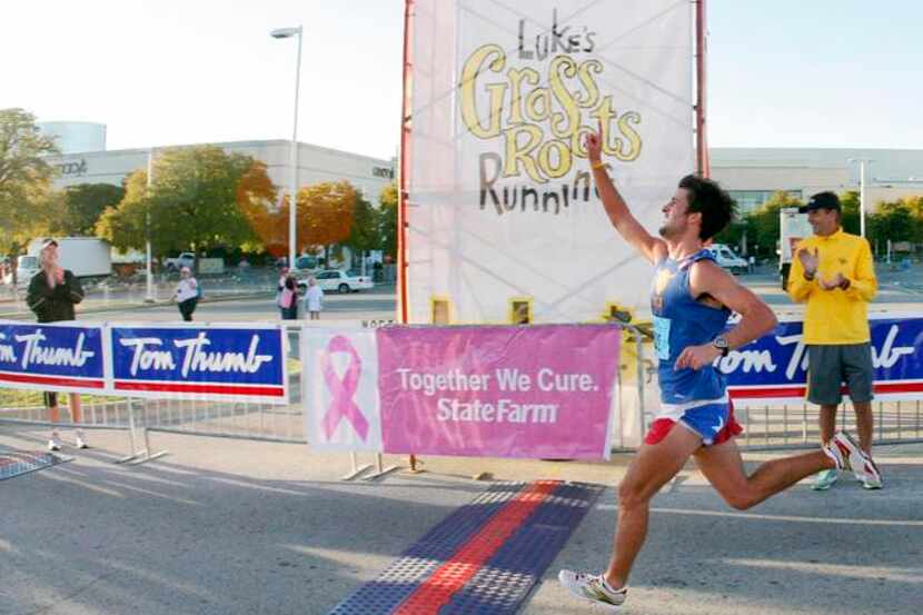 Logan Sherman of Dallas celebrated his win in the men's division of the Race for the Cure...