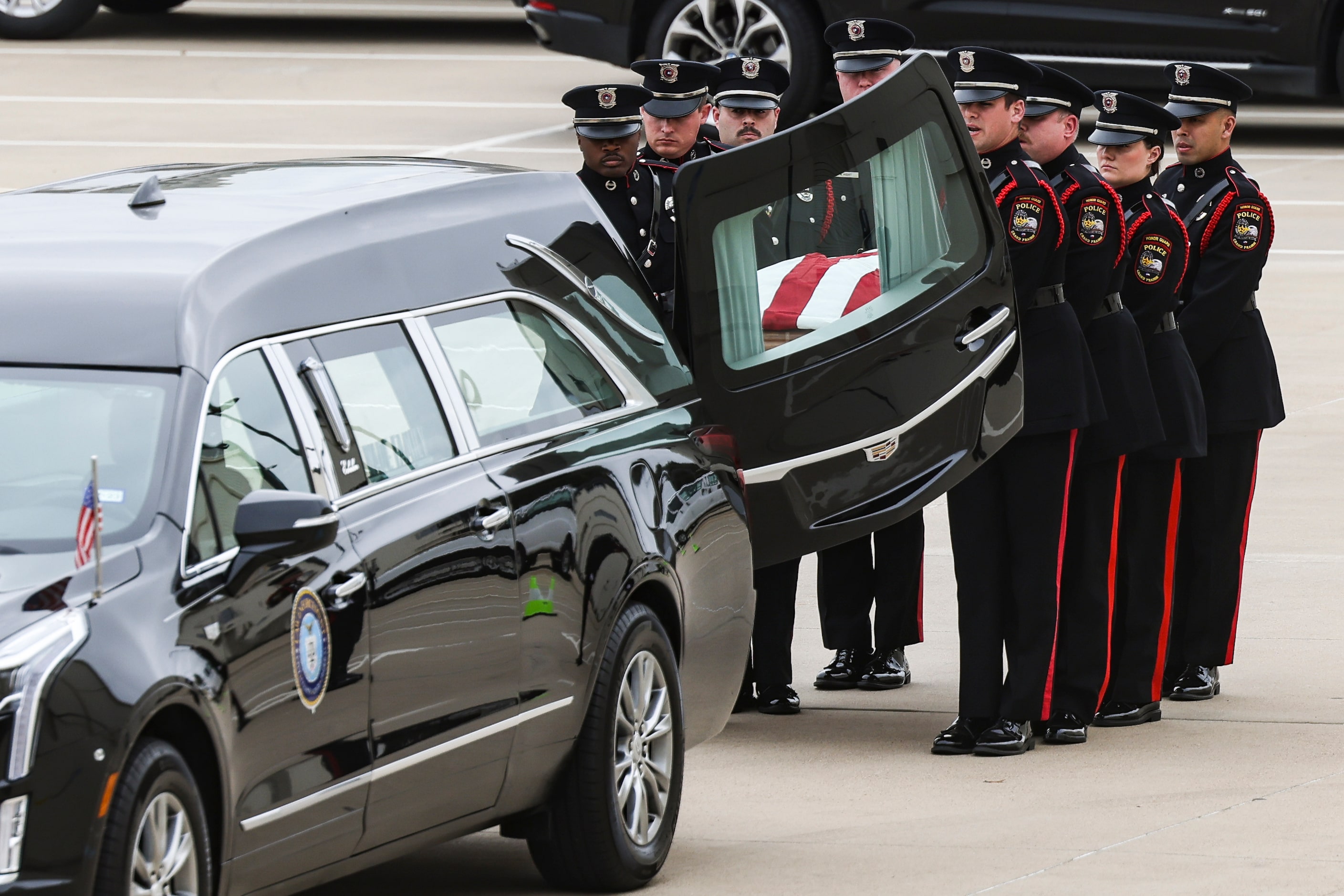 Grand Prairie Police Department Honor Guard place Grand Prairie police officer Brandon P....