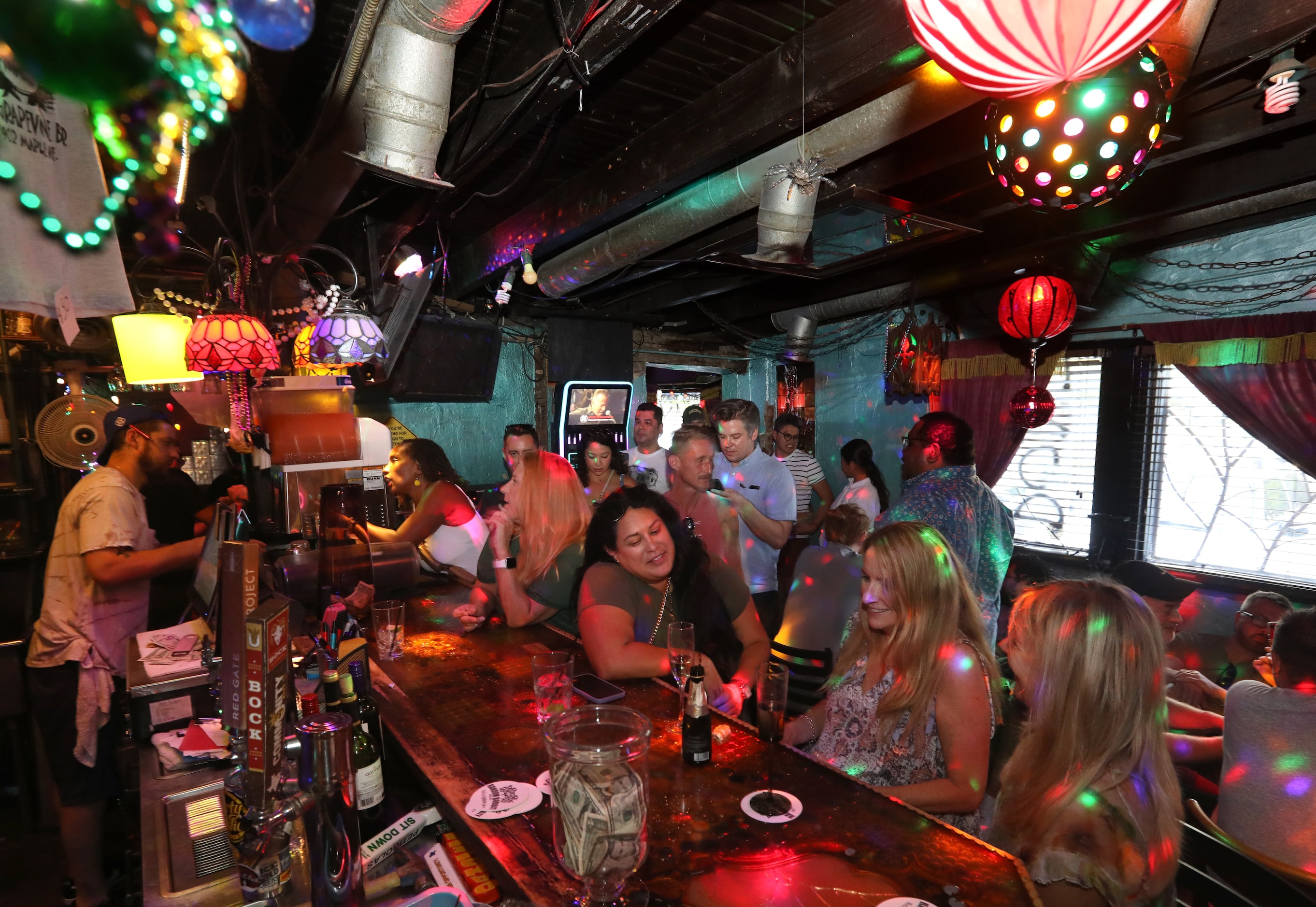 Guests enjoy one last evening at the Grapevine Bar in Dallas, TX, on Aug 23, 2023.  (Jason...