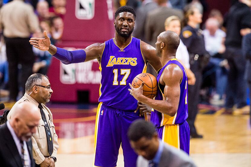 CLEVELAND, OH - FEBRUARY 10: Roy Hibbert #17 of the Los Angeles Lakers talks to Kobe Bryant...
