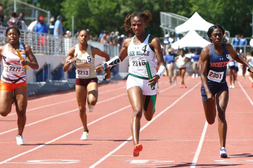 Mansfield Lake Ridge sprinter Ariel Ford sails to the finish line to help her team win the...