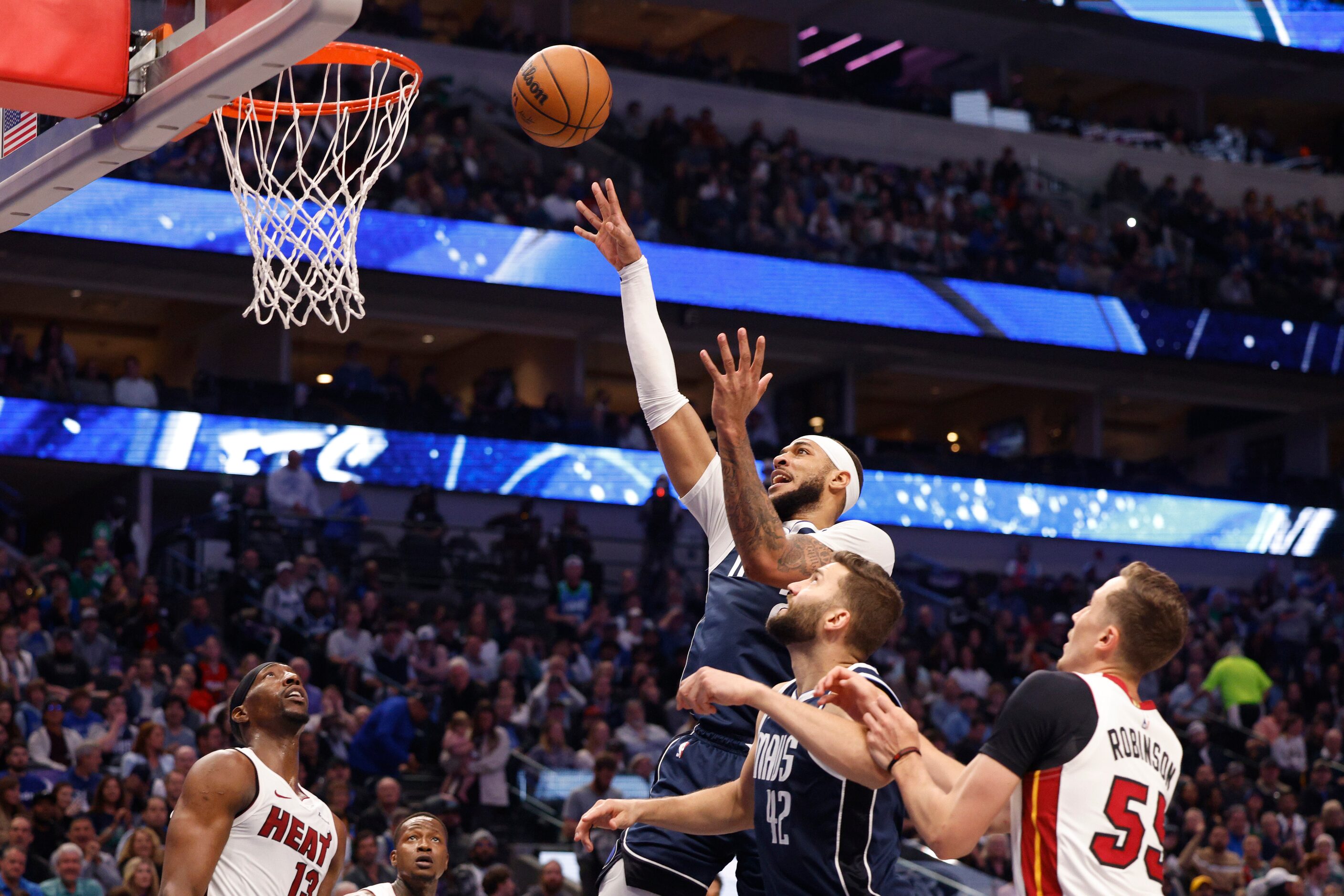 Dallas Mavericks center Daniel Gafford (21) shoots the ball during the first half of an NBA...