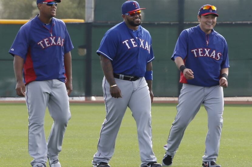 Texas' Adrian Beltre, Prince Fielder and Shin-Soo Choo are pictured during Texas Rangers...