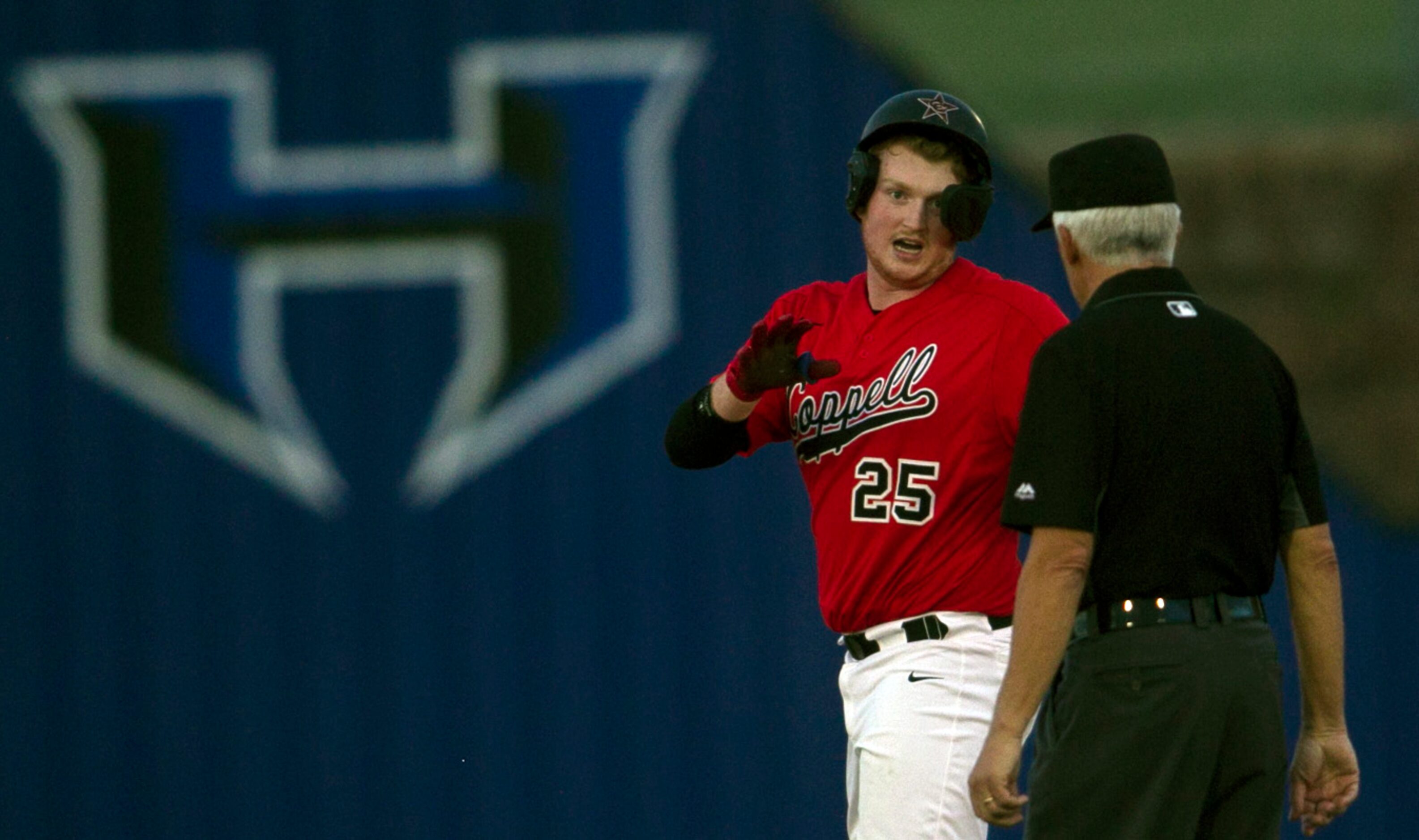 Coppell pitcher Chayton Krauss (25) asks for time-out as he is relieved by a pinch runner...