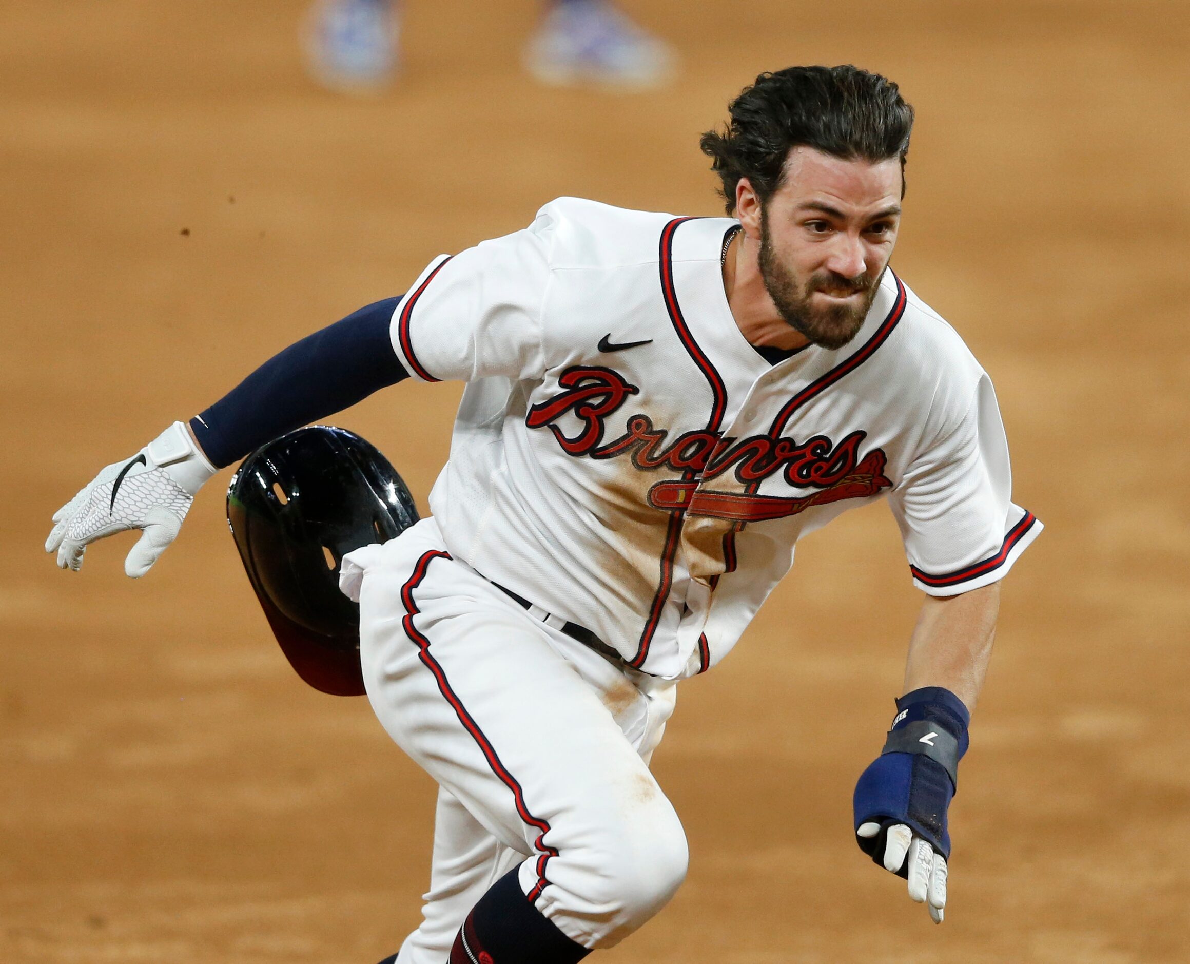 Atlanta Braves shortstop Dansby Swanson (7) runs to third base off a hit from Atlanta Braves...