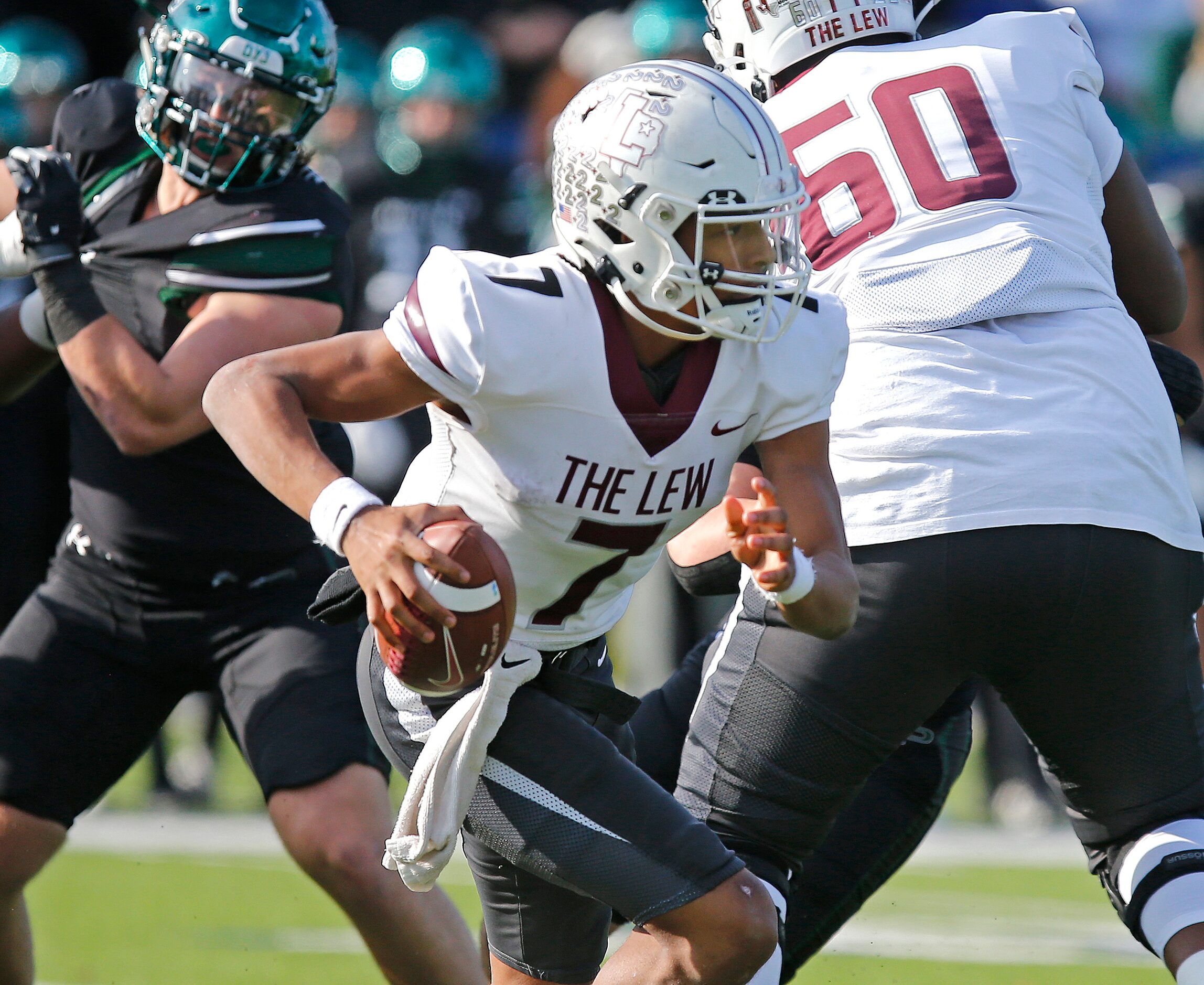 Lewisville High School quarterback Ethan Terrell (7) scrambles during the first half as...