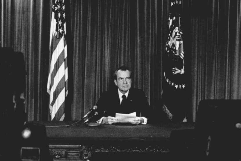 
August 8, 1974, file photo of President Nixon announcing his resignation during a broadcast...