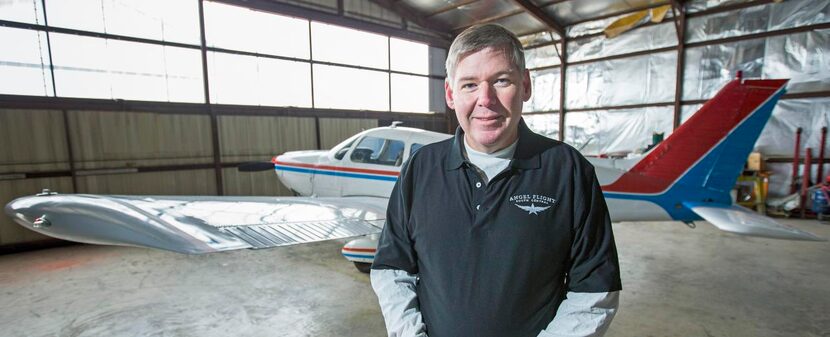 
Pilot Kurtis Sampson flies his four-seat Piper Cherokee airplane (background) out of Aero...