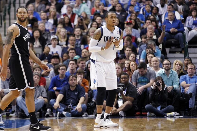 Dallas Mavericks guard Monta Ellis (11) reacts after a referee called a foul on him during...