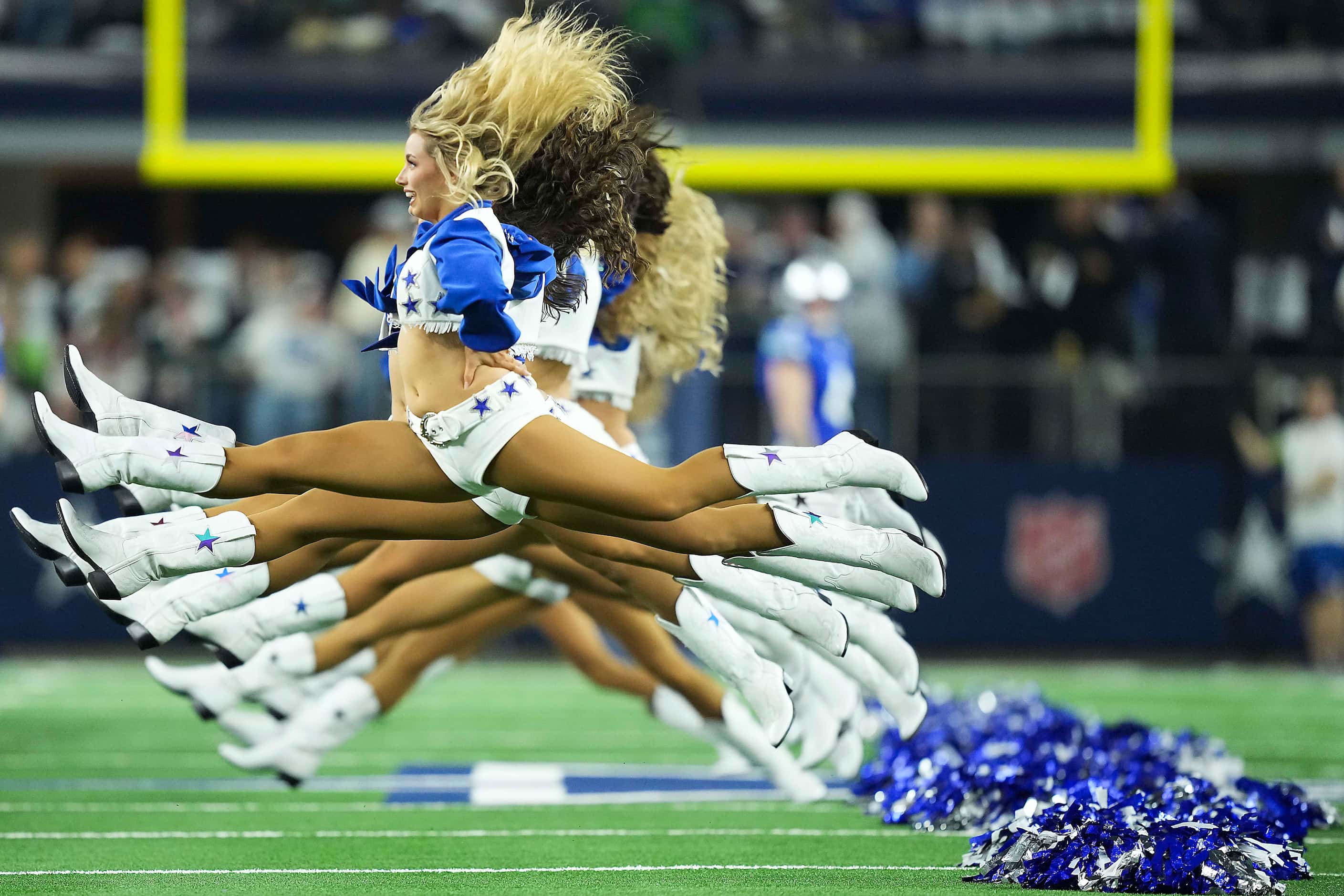 Dallas Cowboys cheerleaders perform before an NFL football game against the Seattle Seahawks...