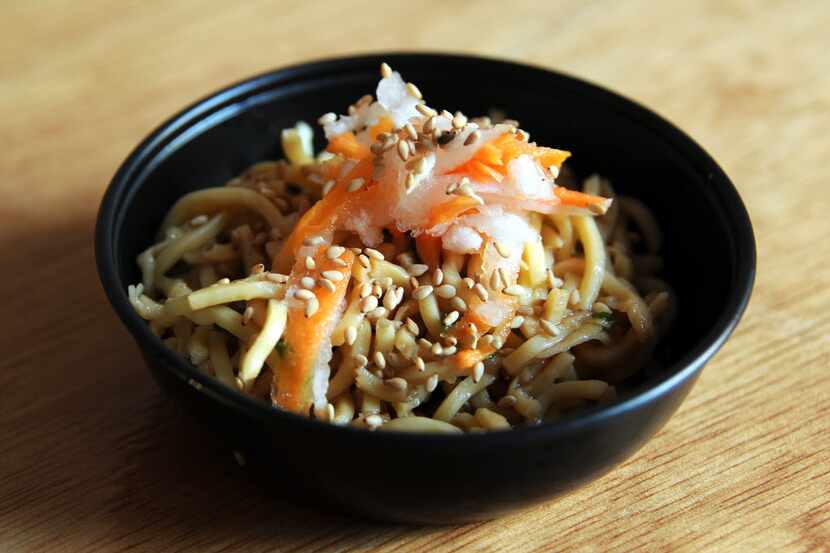 Steel Restaurant and Lounge serves yakisoba noodles with ginger scallion sauce at The...