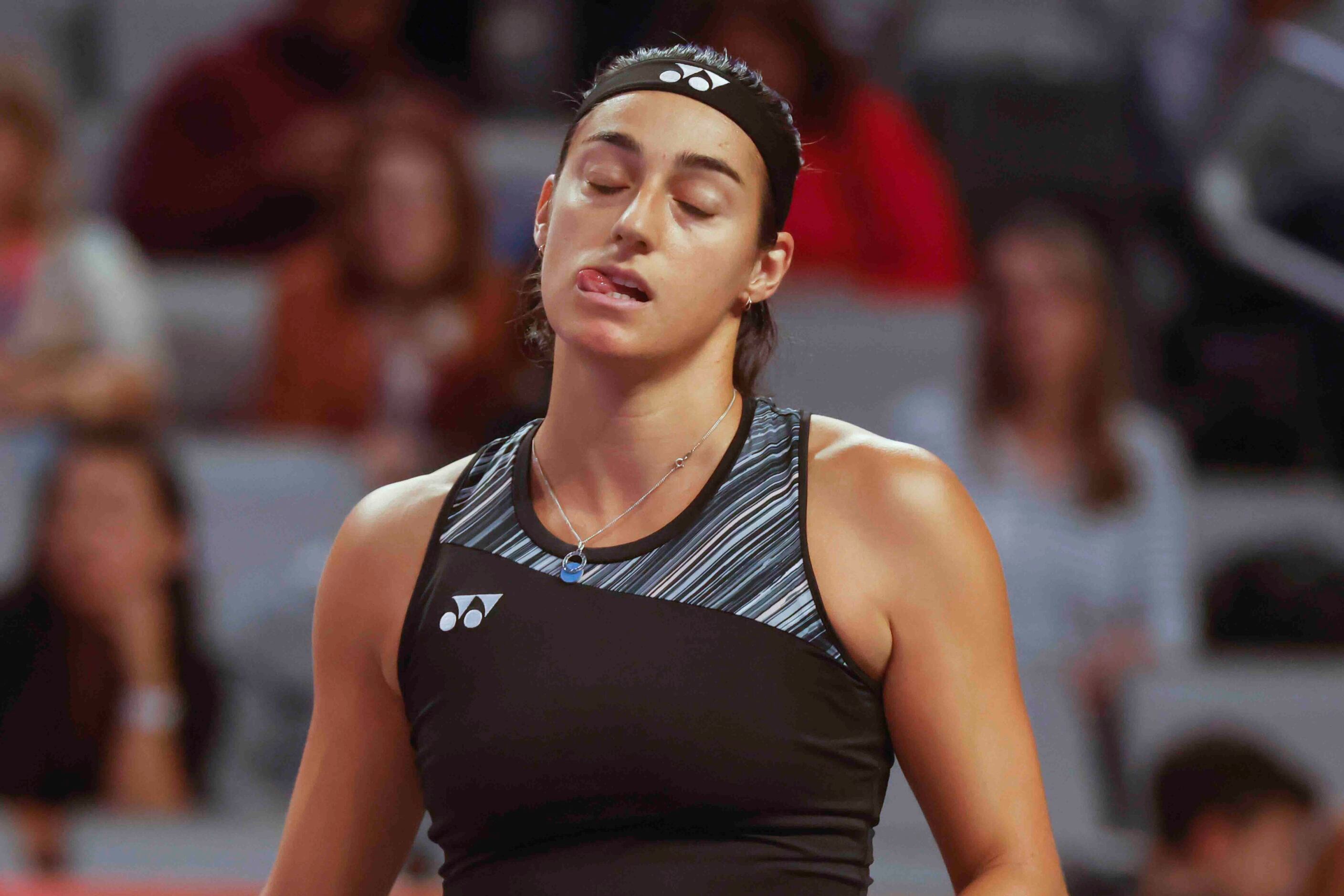 Caroline Garcia of France reacts after missing a point against Coco Gauff of the USA on day...