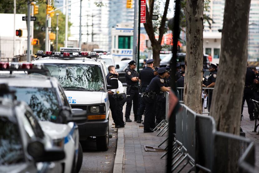 Officers keep watch in the park at Dag Hammarskjold Plaza near United Nations Headquarters...