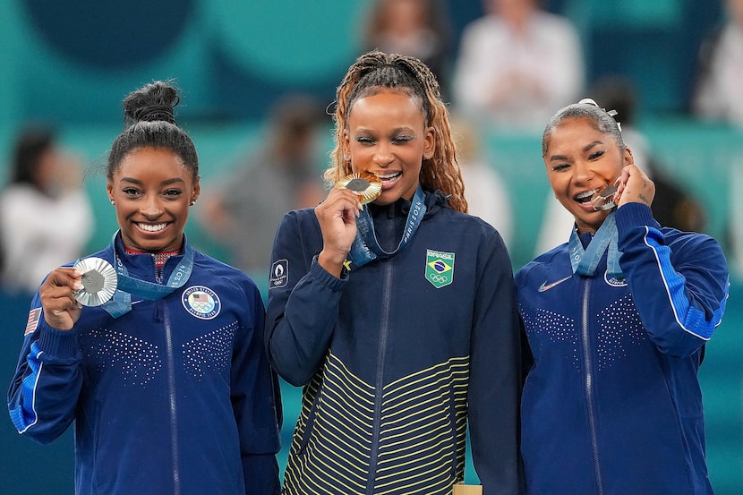 From left, silver medalist Simone Biles of the United States, gold medalist Rebeca Andrade...