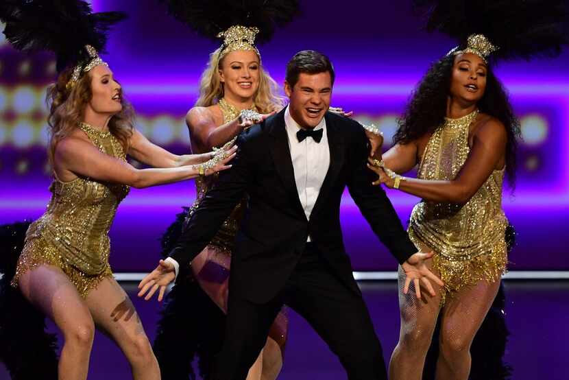 US actor Adam DeVine performs onstage during the 71st Emmy Awards at the Microsoft Theatre...