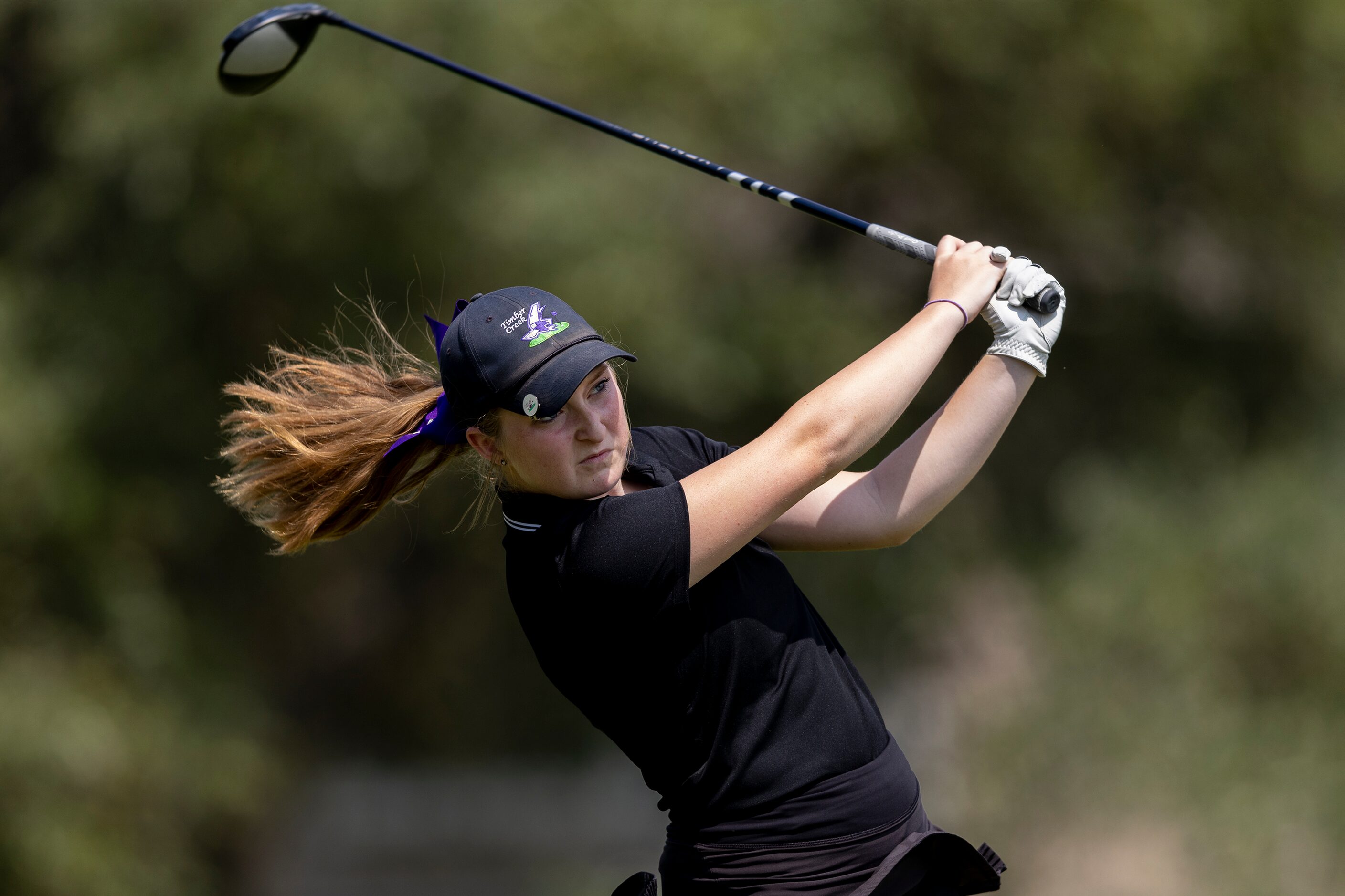 Timber Creek’s Samantha Gibbs hits from the 11th tee box during the 6A girls state golf...