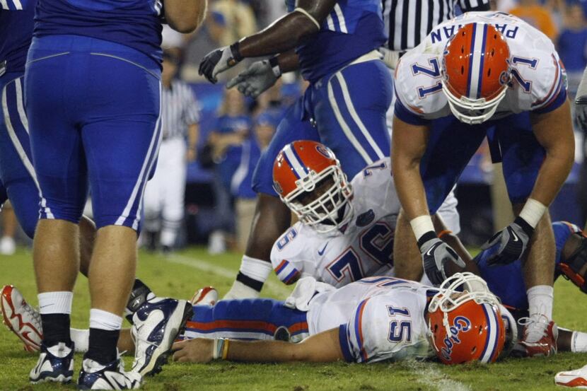 FILE - In this Sept. 26, 2009, file photo, Florida Matt Patchan (71) and Marcus Gilbert (76)...