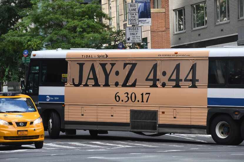 This file photo taken on June 29, 2017 shows a New York City bus with an advertisement for...