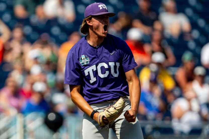 TCU pitcher Ben Abeldt celebrates after a win over Virginia in a baseball game at the NCAA...