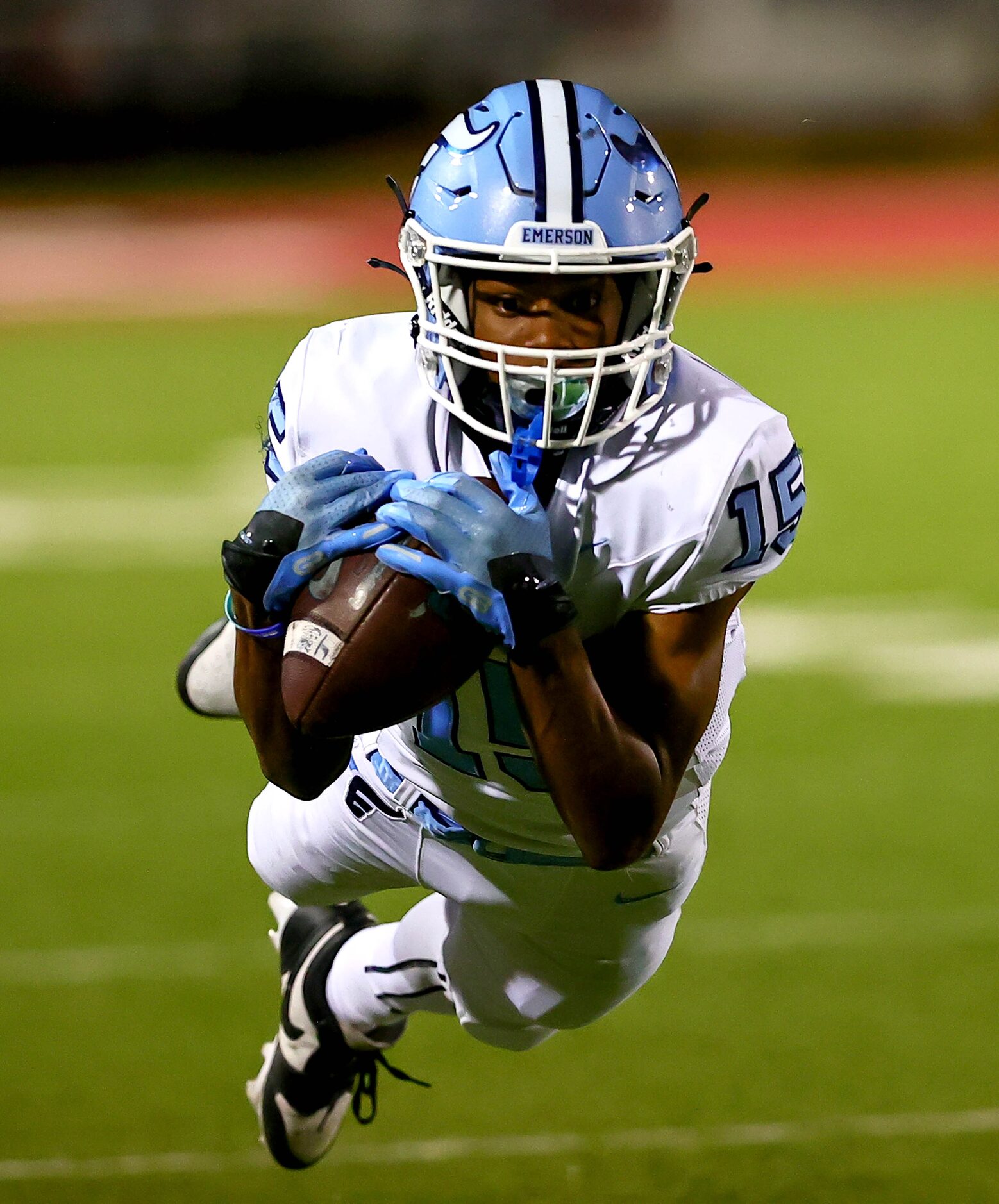 Frisco Emerson wide receiver Cameron Newborn comes up with a diving reception against Argyle...